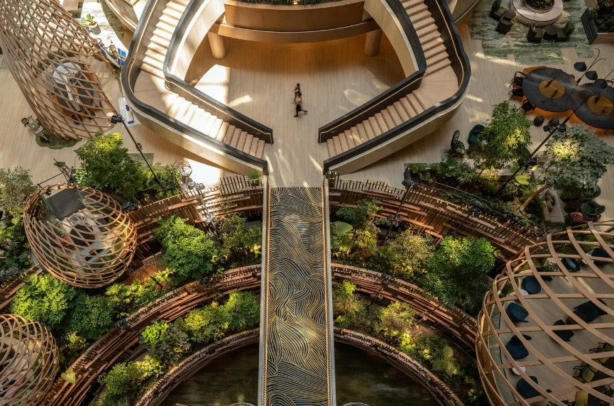 Photo shows indoors of park royal collection marina bay singapore, indoor greenery
